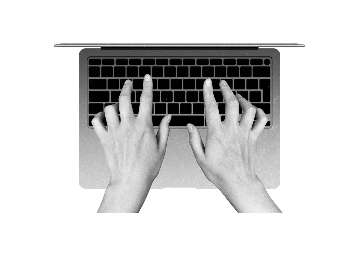 Hands typing on a laptop while writing online content, representing content creation that ranks on Google and gets quoted by AI