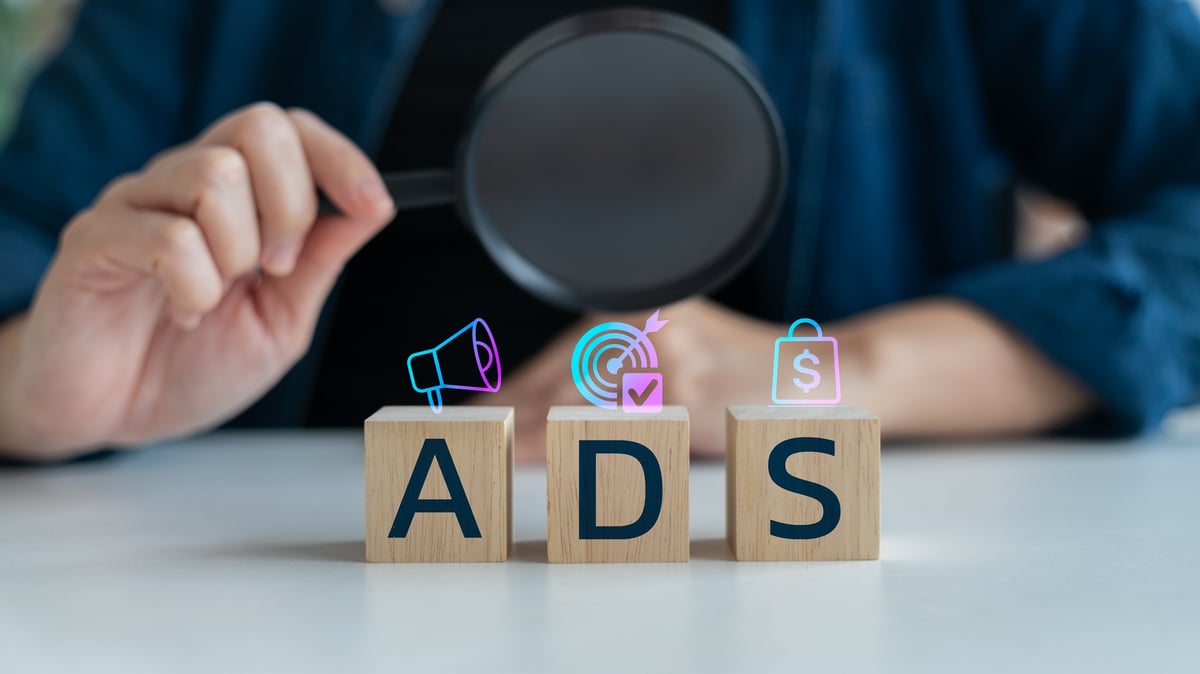 Marketer reviewing Google Ads performance and deciding where to cut wasted spend.