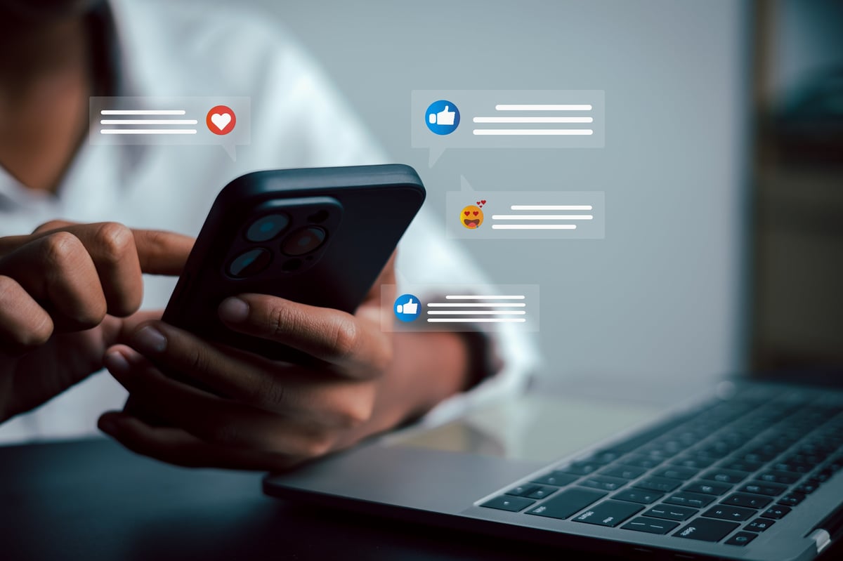 A phone showing a social feed, representing brand touchpoints.