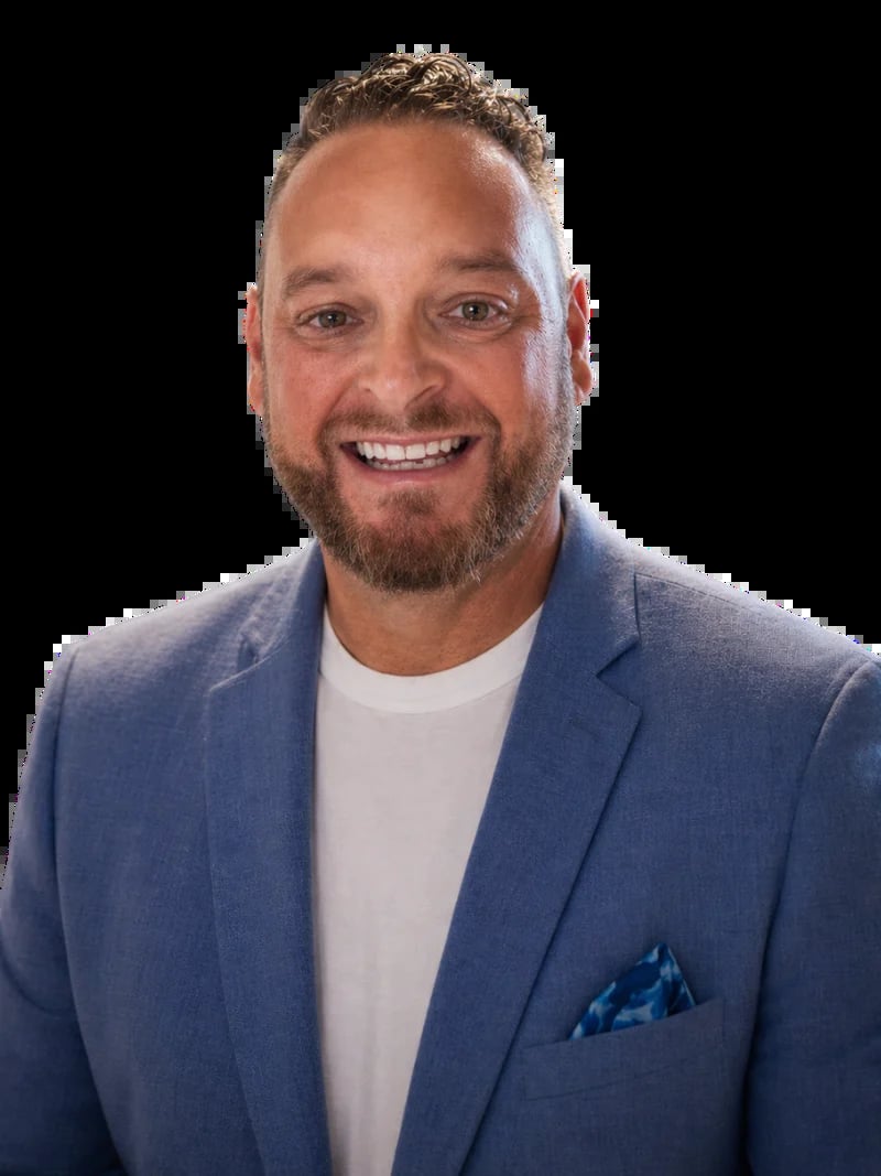 Matt Williamson, Founder and Managing Director of Digital Marketing Adelaide, smiling in a blue blazer